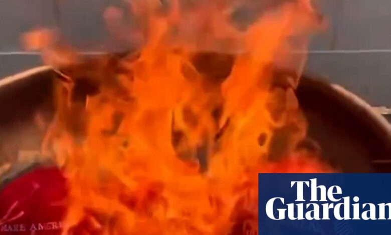 Trump supporters burn Maga hats after he dismisses Epstein files furor as ‘hoax’