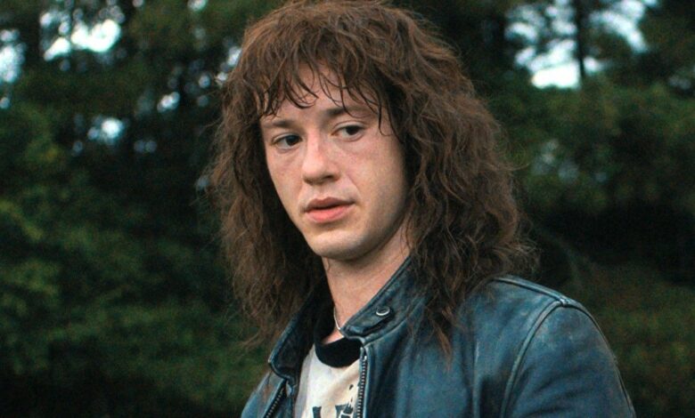 Eddie Munson (Joseph Quinn) in Stranger Things season 4 looking offscreen