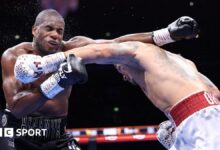 Oleksandr Usyk lands a left hand on Daniel Dubois