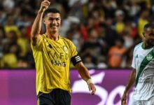 Cristiano Ronaldo em ação em duelo entre Hungria e Portugal, pelas Eliminatórias