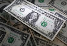 Dollar dented by simmering trade tensions, rate cut bets