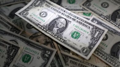 Dollar dented by simmering trade tensions, rate cut bets